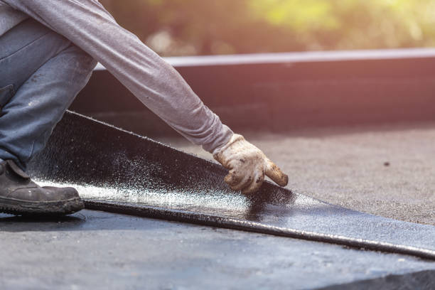 Professional Waterproofing technician working in Hopkins, MI